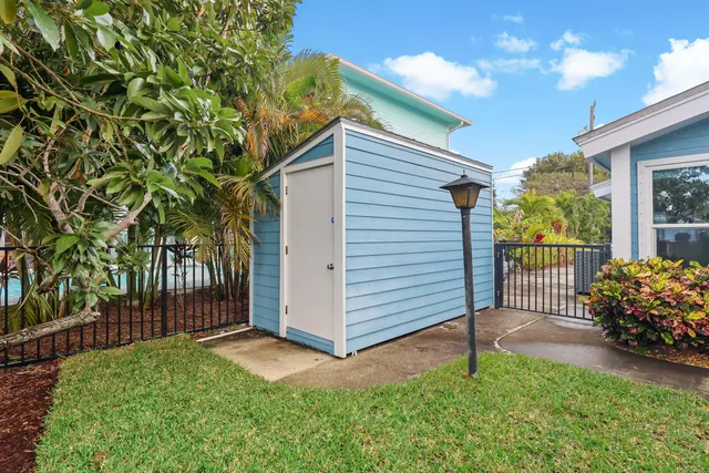 a view of a terrace with furniture and a kitchen