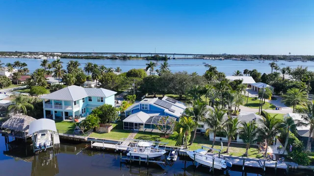 an aerial view of house with yard