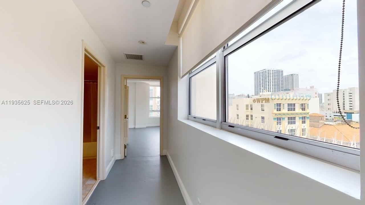 111 East Flagler Street, Unit 810 Miami, FL 33131 - Photo 10 of 19 a view of a balcony and city view