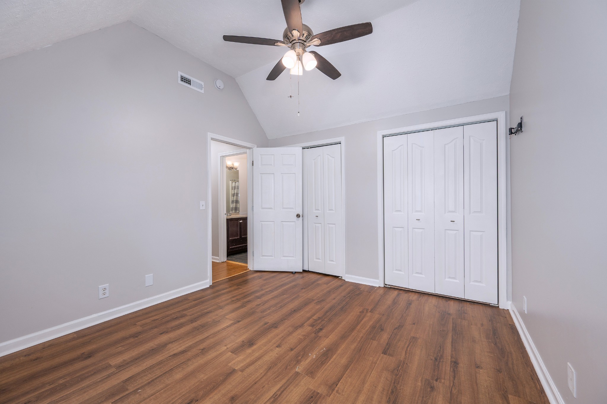 1209 Fall Parkway Murfreesboro, TN 37129 - Photo 13 of 22 wooden floor in an empty room with a window