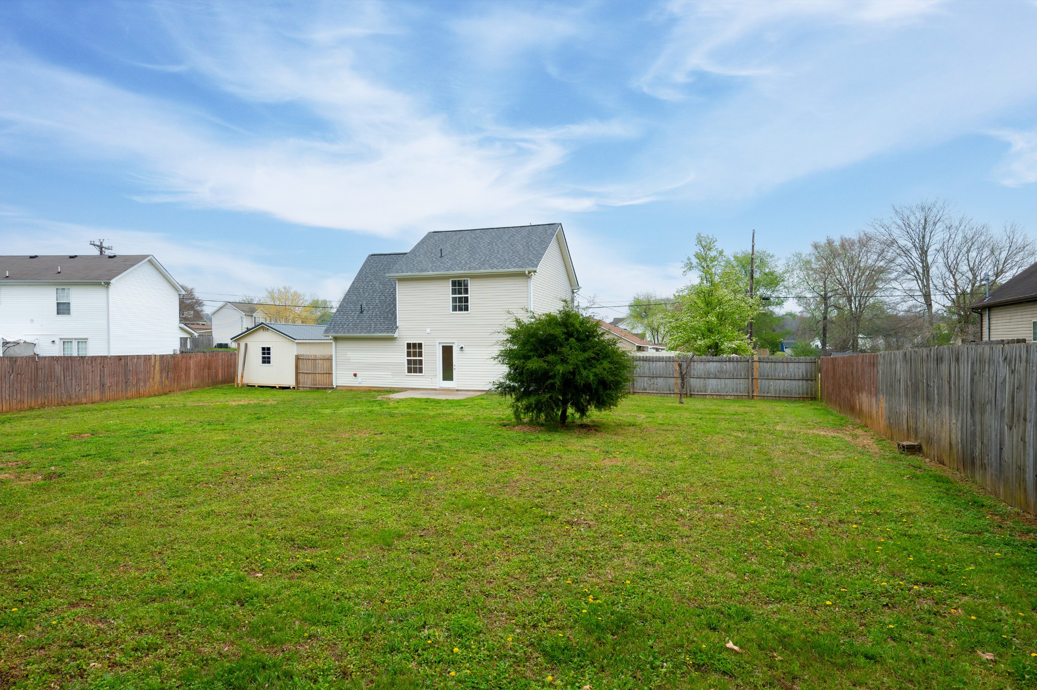 1209 Fall Parkway Murfreesboro, TN 37129 - Photo 18 of 22 a view of a house with a back yard
