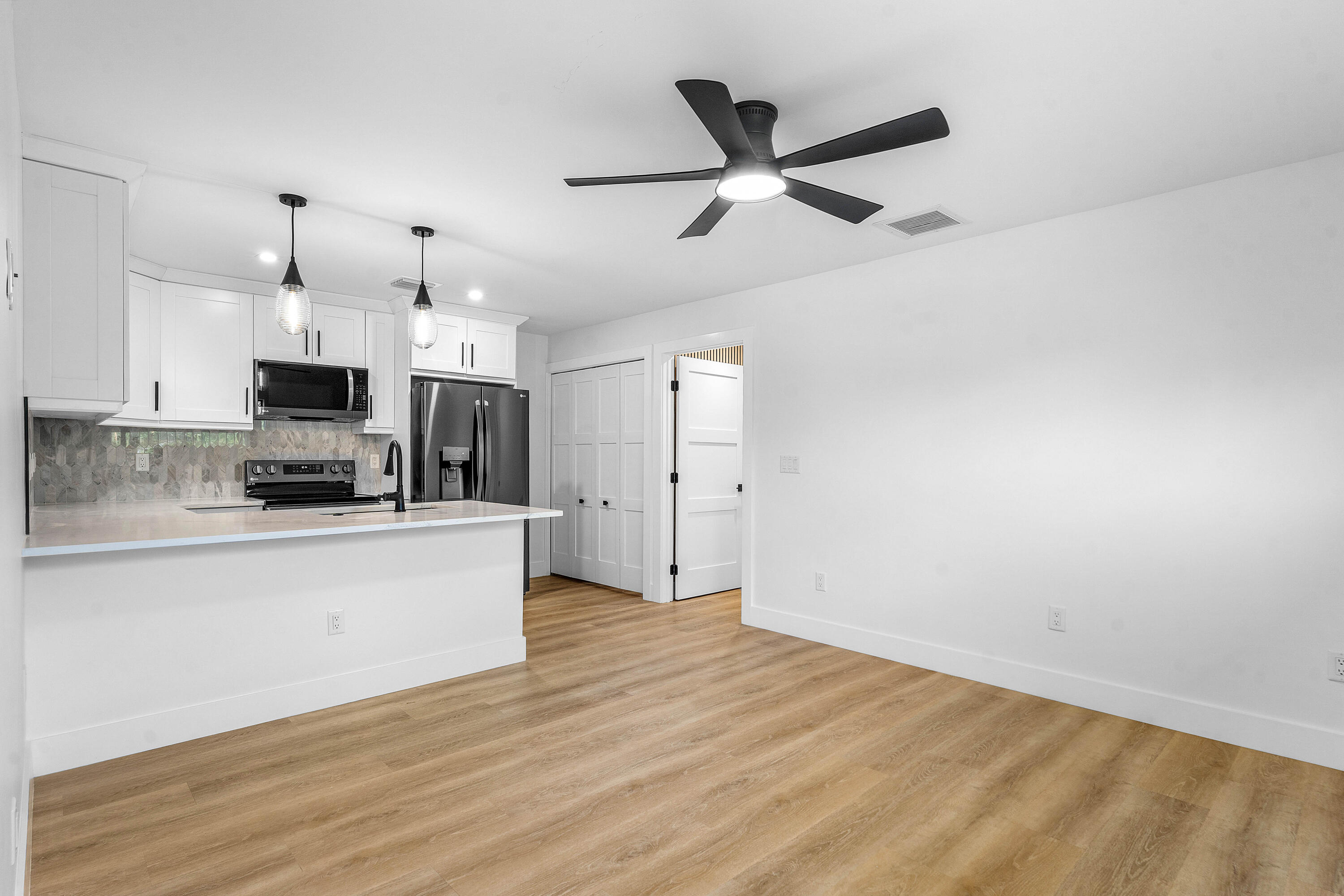5701 Old Orange Road Jupiter, FL 33458 - Photo 35 of 46 a view of a kitchen with electric appliances