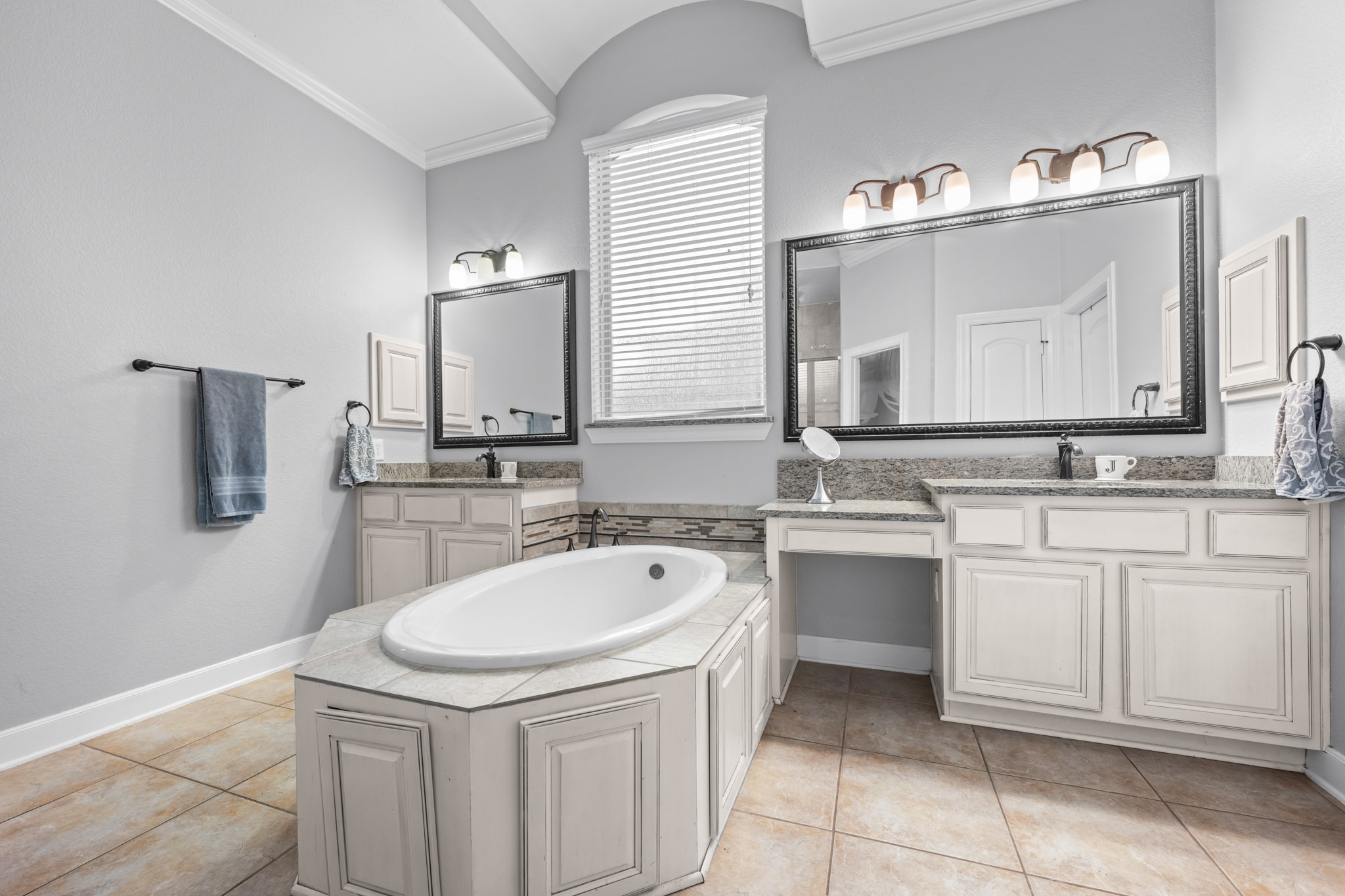 27 Fury Ranch Place Tomball, TX 77375 - Photo 16 of 47 a bathroom with a sink and a mirror