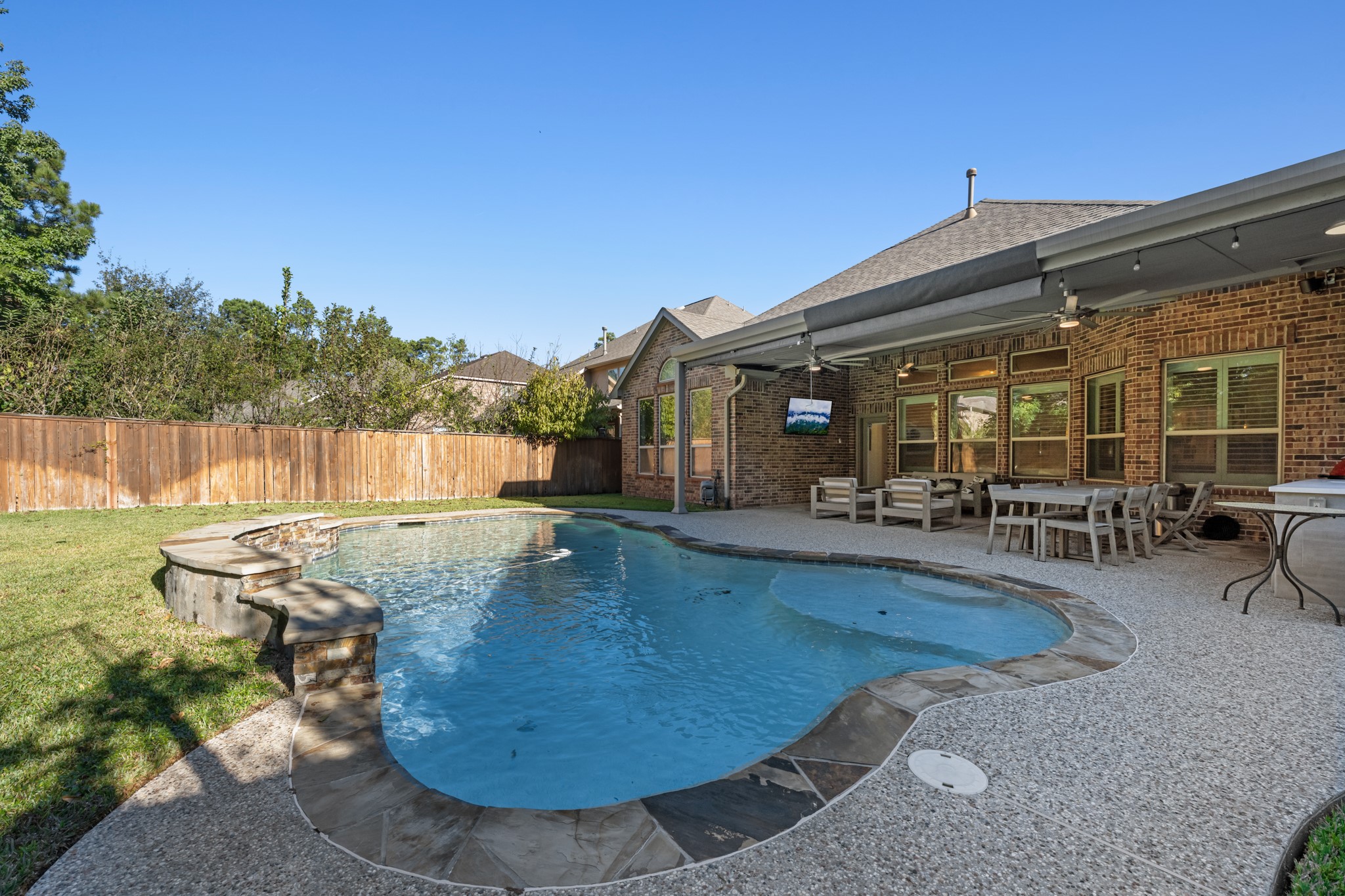 27 Fury Ranch Place Tomball, TX 77375 - Photo 42 of 47 swimming pool view with a outdoor seating