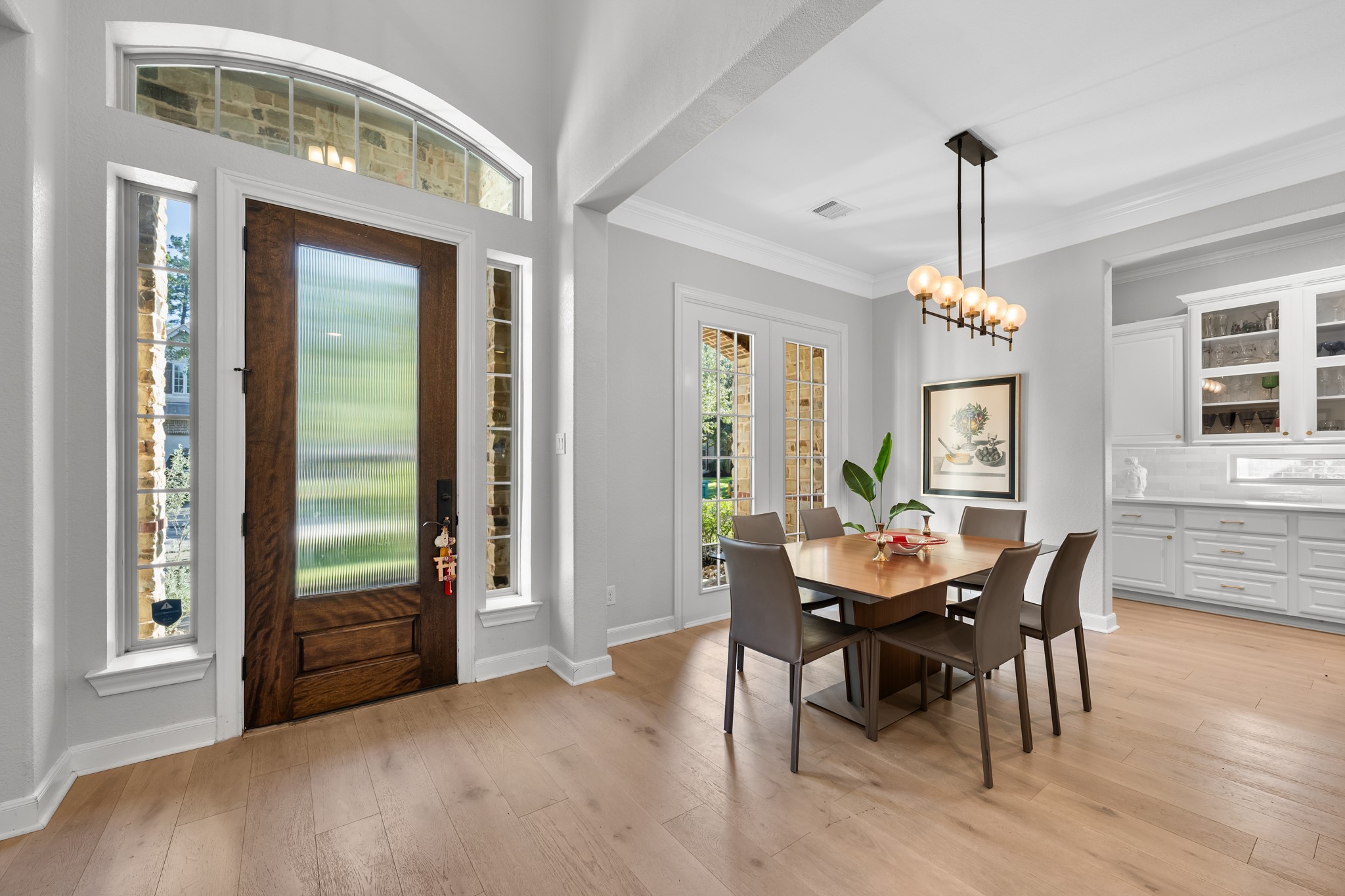 27 Fury Ranch Place Tomball, TX 77375 - Photo 5 of 47 a view of a dining room with furniture window and wooden floor