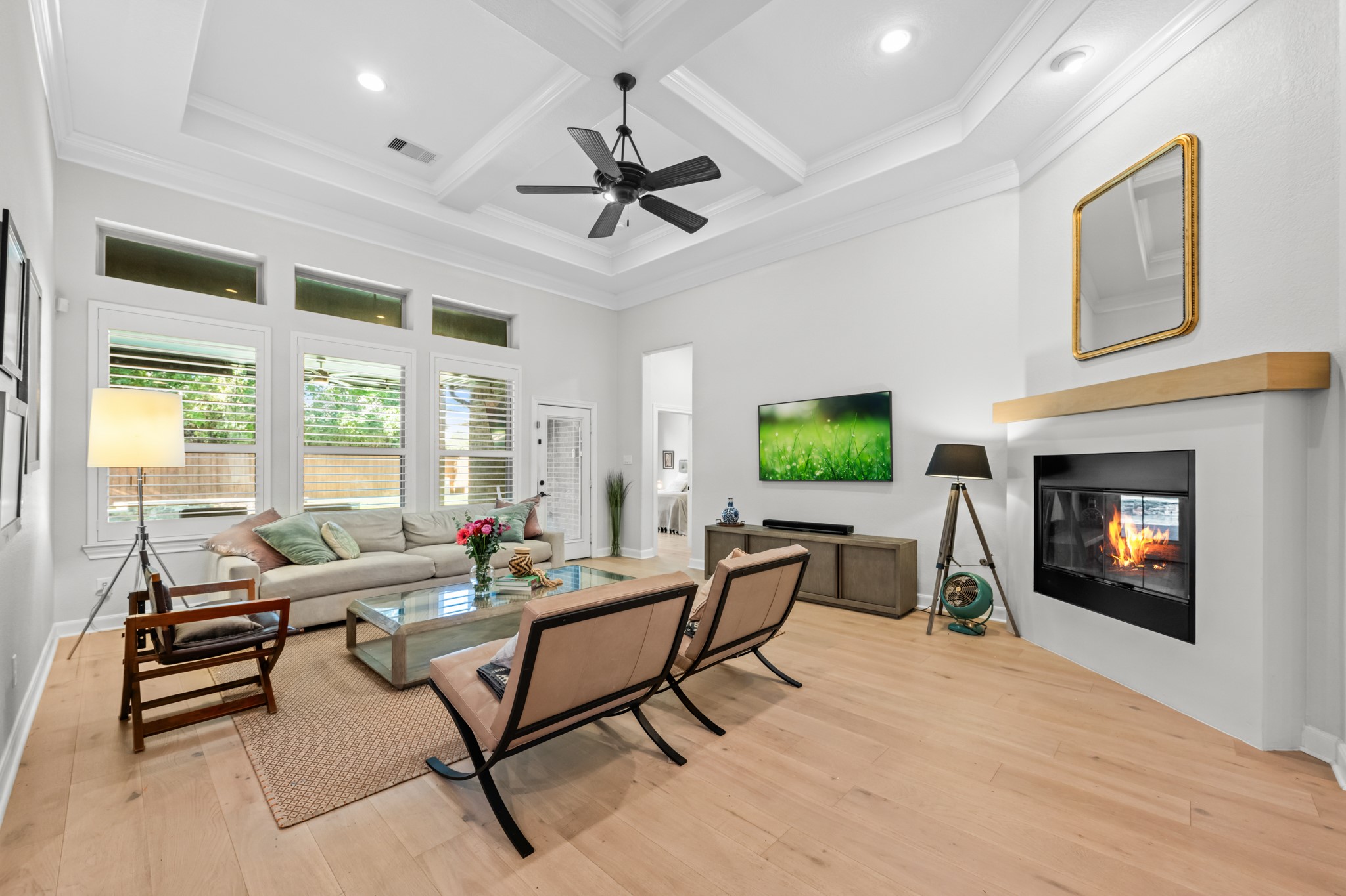 27 Fury Ranch Place Tomball, TX 77375 - Photo 9 of 47 a living room with furniture a window and a fireplace