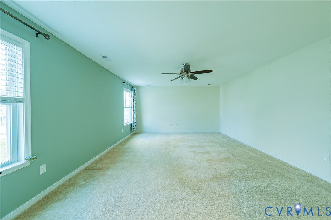 15607 Crowden Road Chesterfield, VA 23832 - Photo 40 of 57 Expansive room featuring light-colored carpeting,