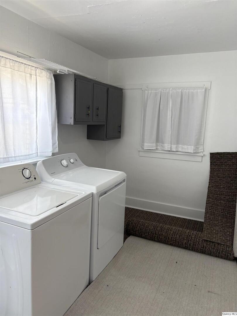 101 North Main Timewell, IL 62375 - Photo 14 of 17 a utility room with a sink a washer and dryer