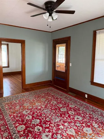 a view of an empty room and window
