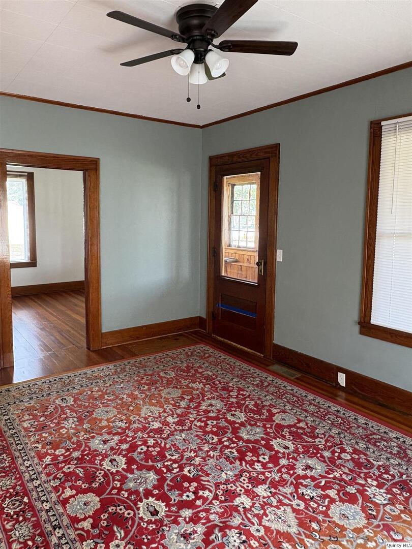 101 North Main Timewell, IL 62375 - Photo 4 of 17 a view of an empty room and window