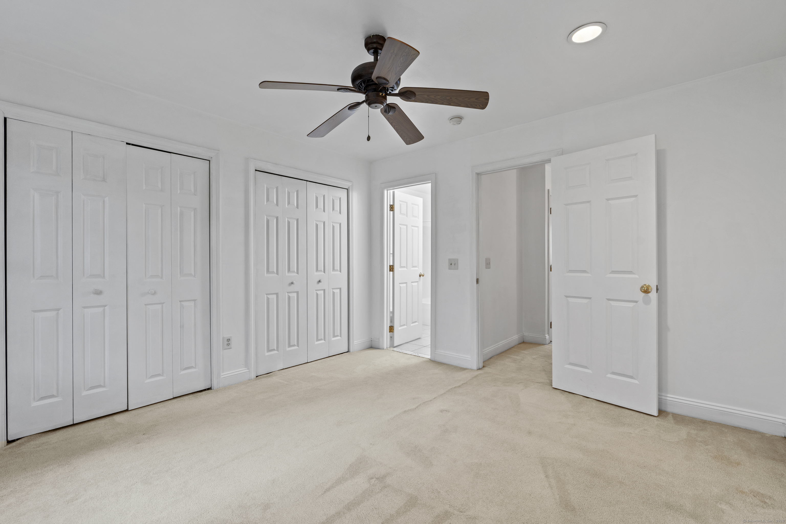 527 West Thames Street, Unit 9 Norwich, CT 06360 - Photo 16 of 25 a view of empty room with a ceiling fan