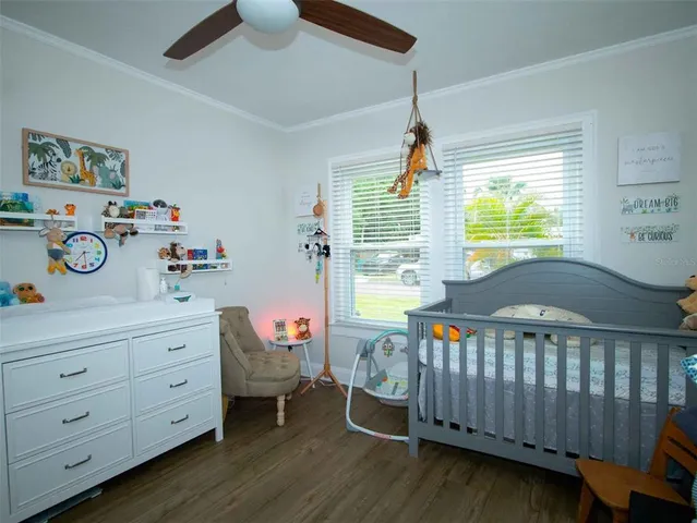 a bed room with a bed and a window