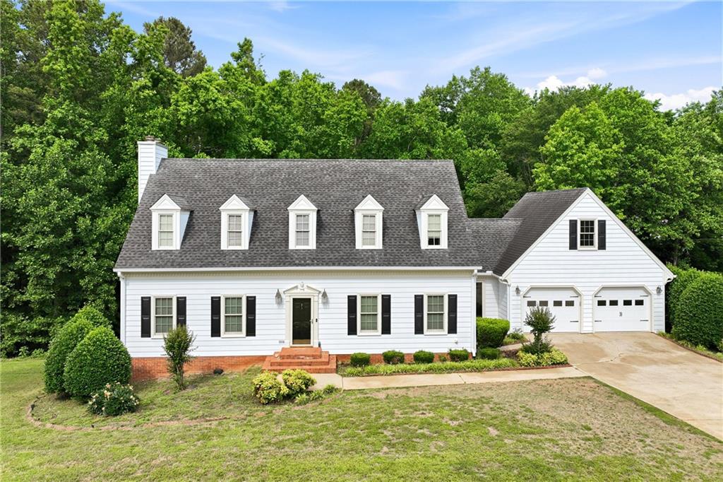 3608 Maple Forge Lane Gainesville, GA 30504 - Photo 1 of 45 a front view of a house with a yard