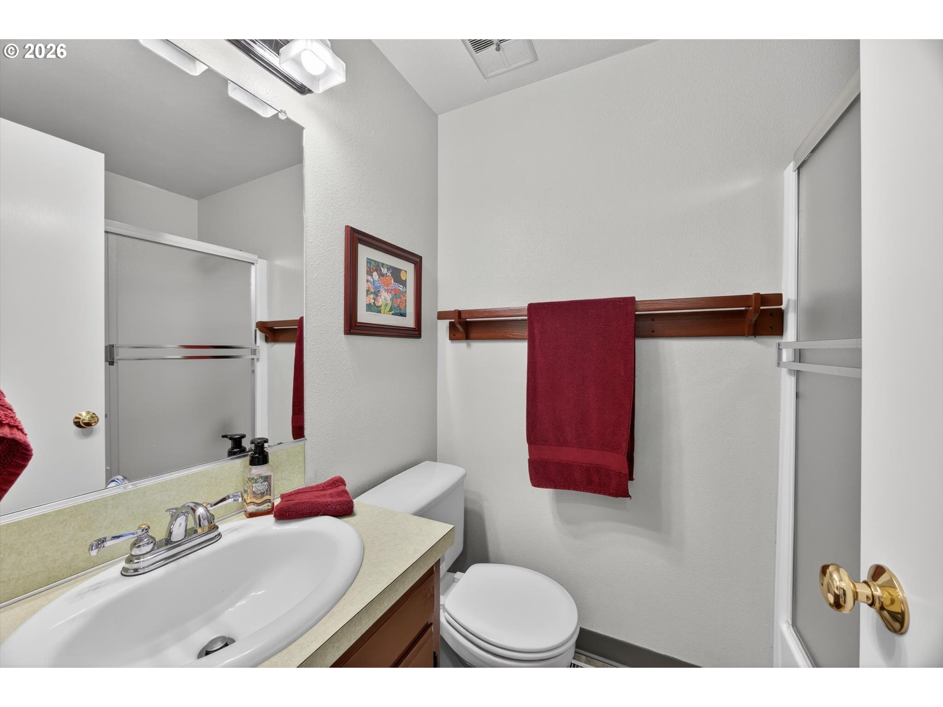 13601 South Union Hall Road Canby, OR 97013 - Photo 20 of 48 a bathroom with a sink toilet and mirror