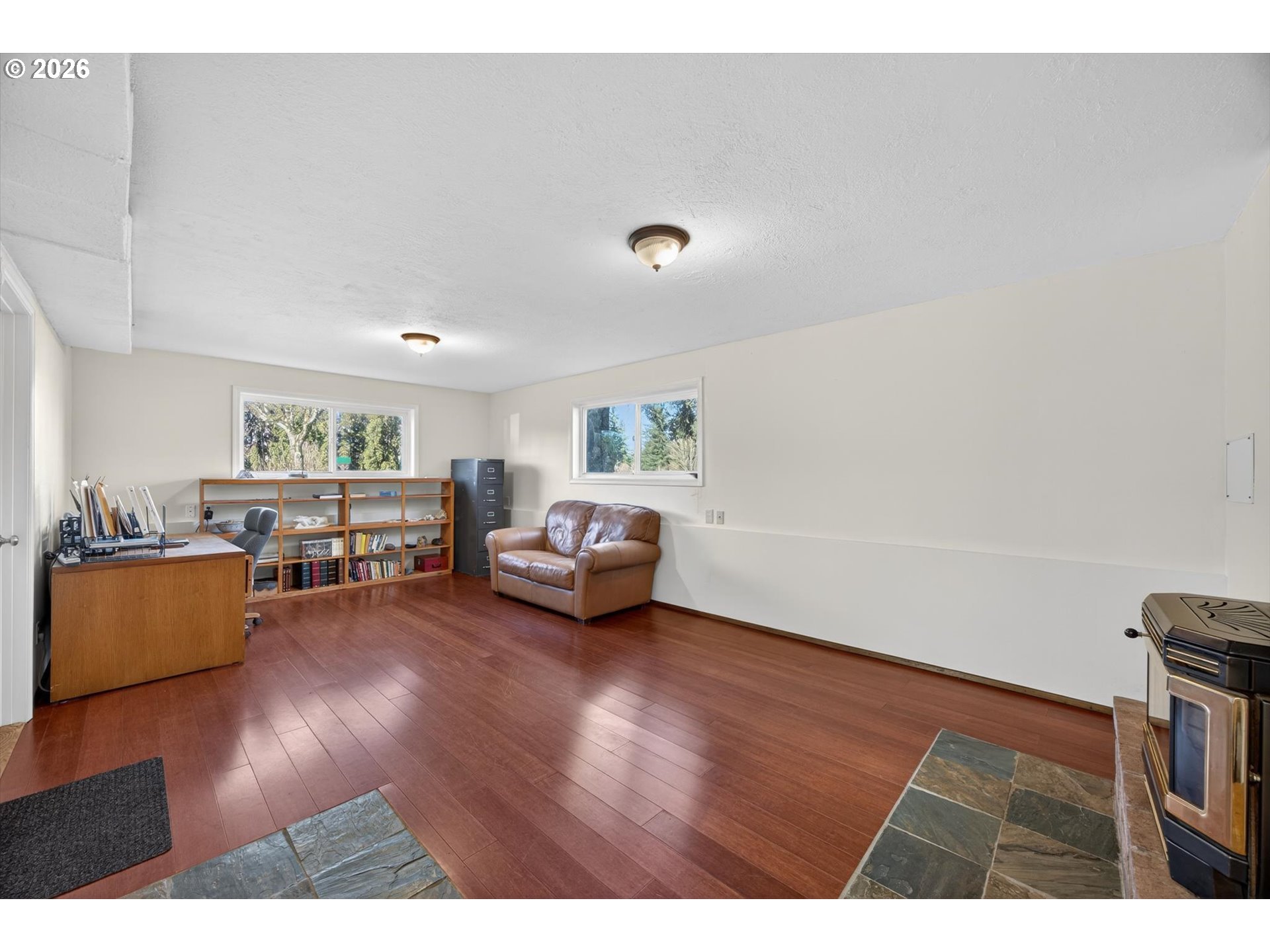 13601 South Union Hall Road Canby, OR 97013 - Photo 26 of 48 a living room with furniture and a wooden floor