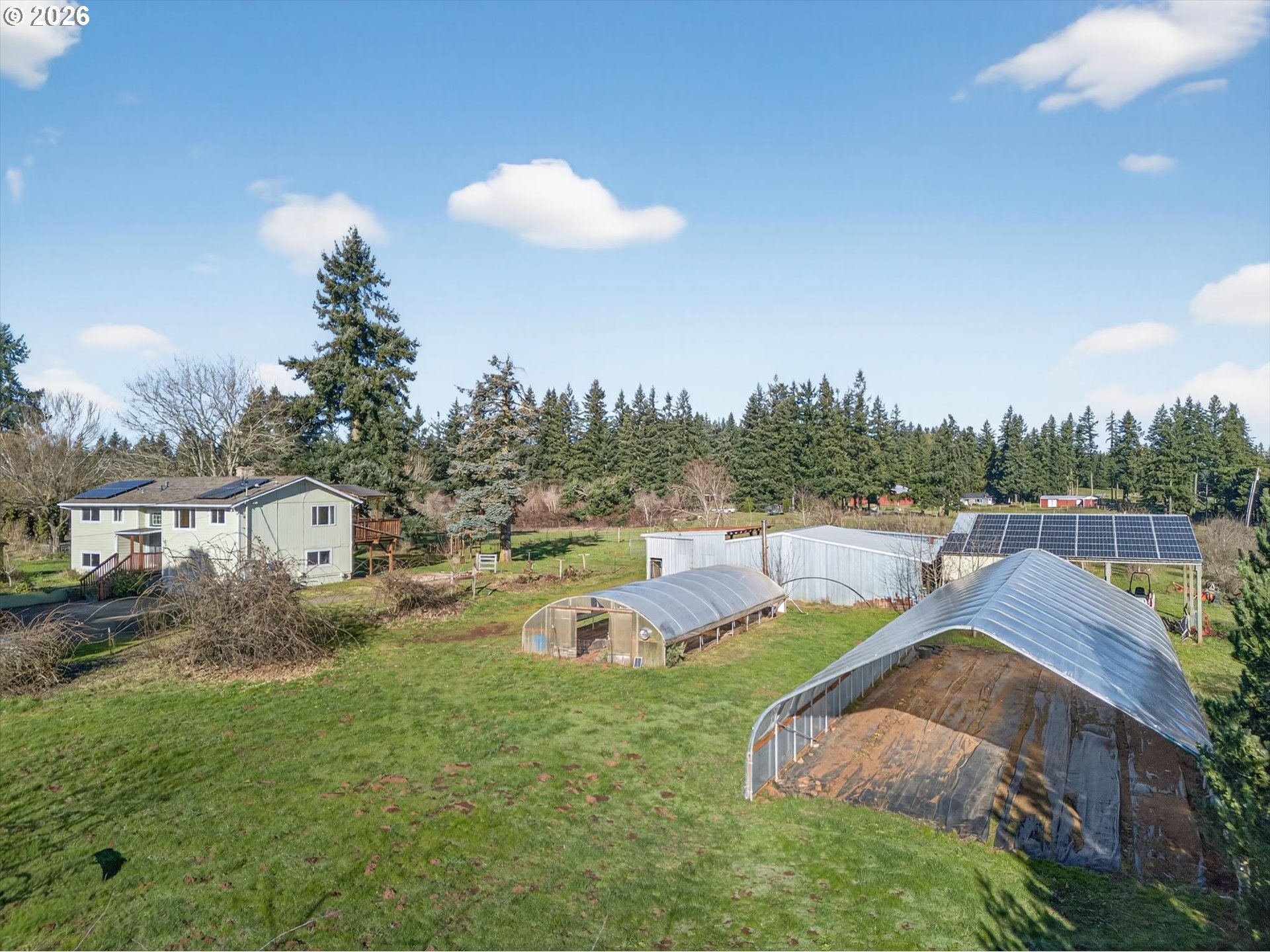 13601 South Union Hall Road Canby, OR 97013 - Photo 40 of 48 a view of a house with pool and a yard