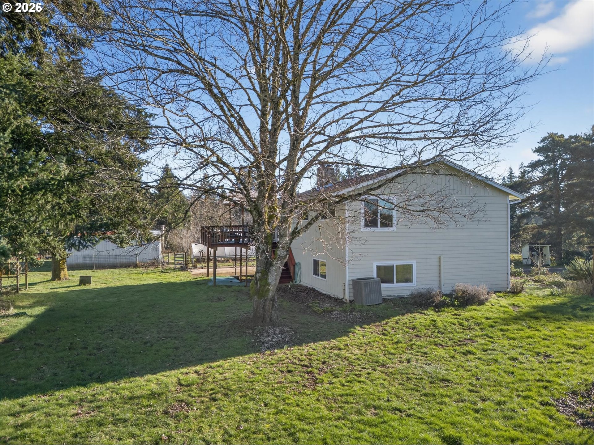13601 South Union Hall Road Canby, OR 97013 - Photo 43 of 48 a view of a house with a yard