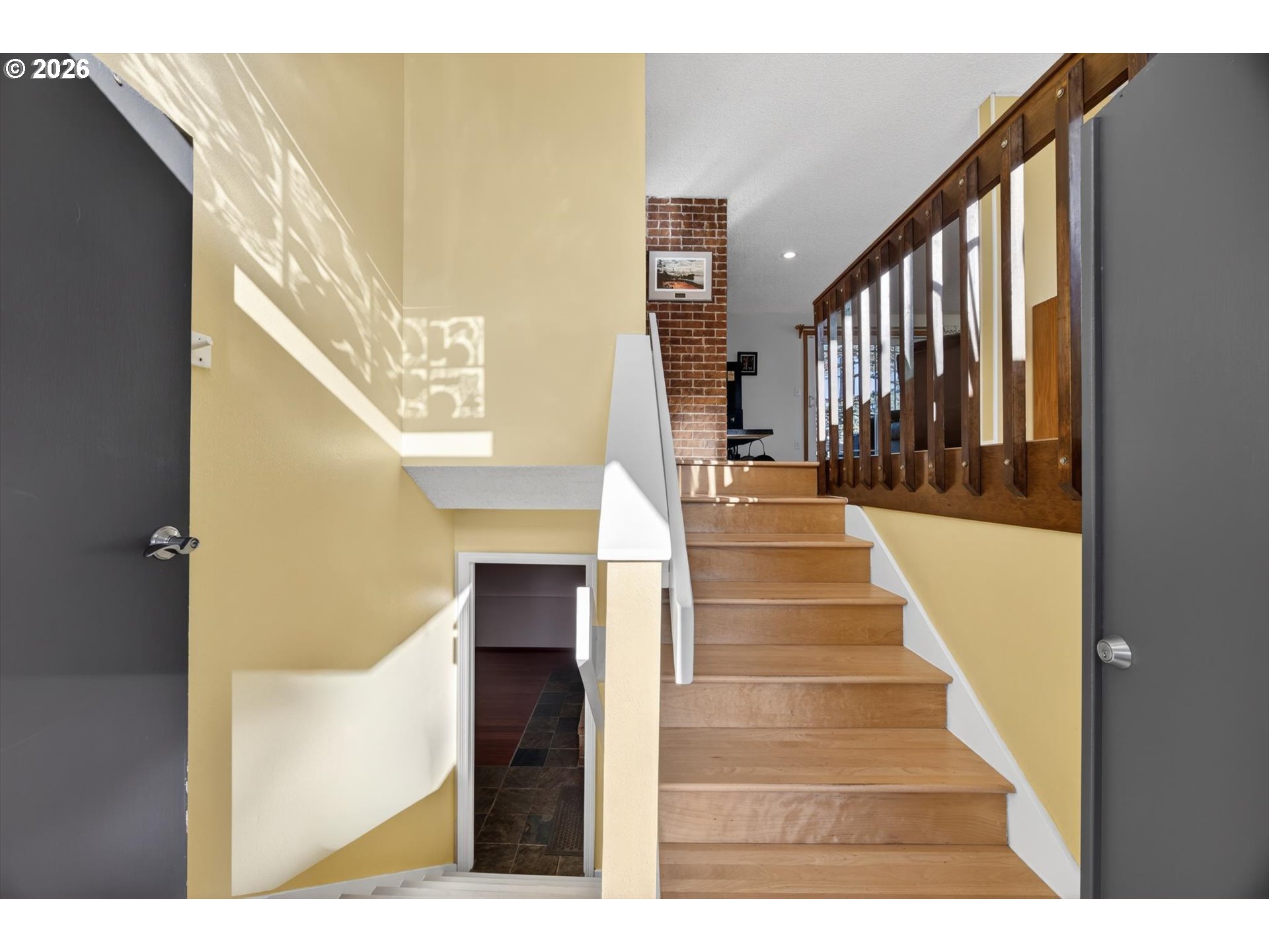 13601 South Union Hall Road Canby, OR 97013 - Photo 5 of 48 a view of staircase with lots of frames and chairs