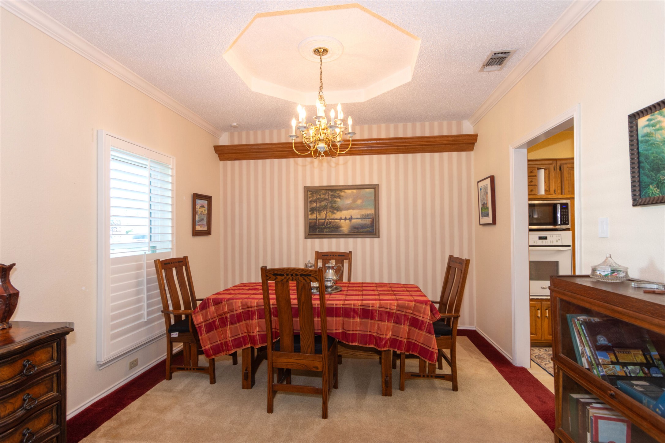 219 Turtle Bend Georgetown, TX 78628 - Photo 10 of 37 The Formal dining area is just a step out side of the kichen space.