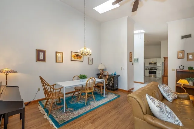 a view of a livingroom with furniture and wooden floor