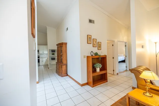 a view of a bedroom with walk in closet and bedroom