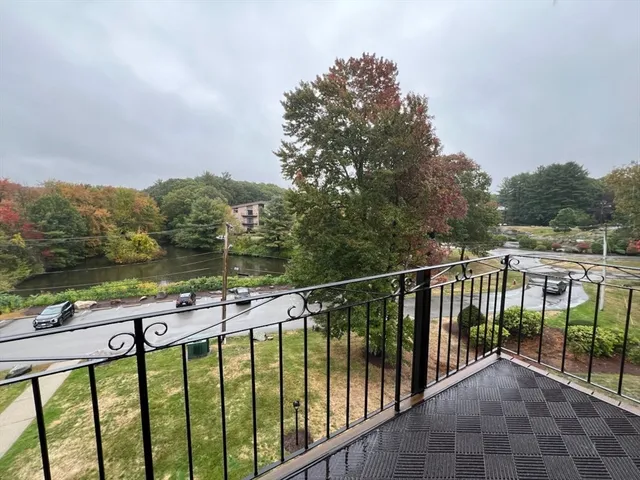 a view of a balcony with lake view