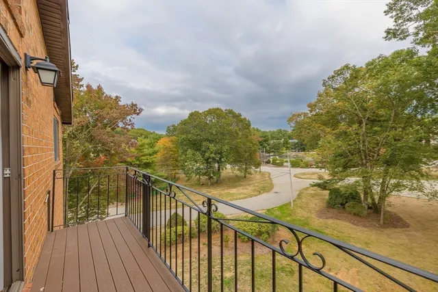 a view of a balcony with an outdoor space
