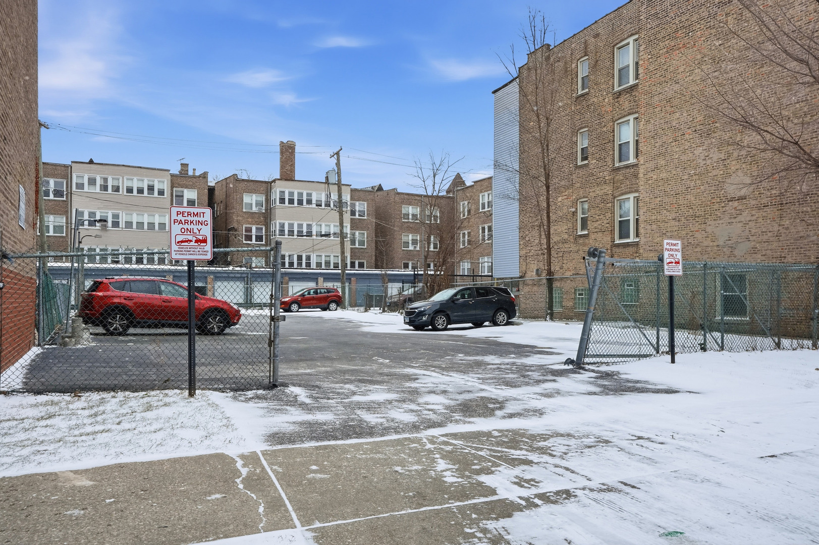 2212 East 70th Street, Unit 1B Chicago, IL 60649 - Photo 20 of 20 a car parked on the side of a street