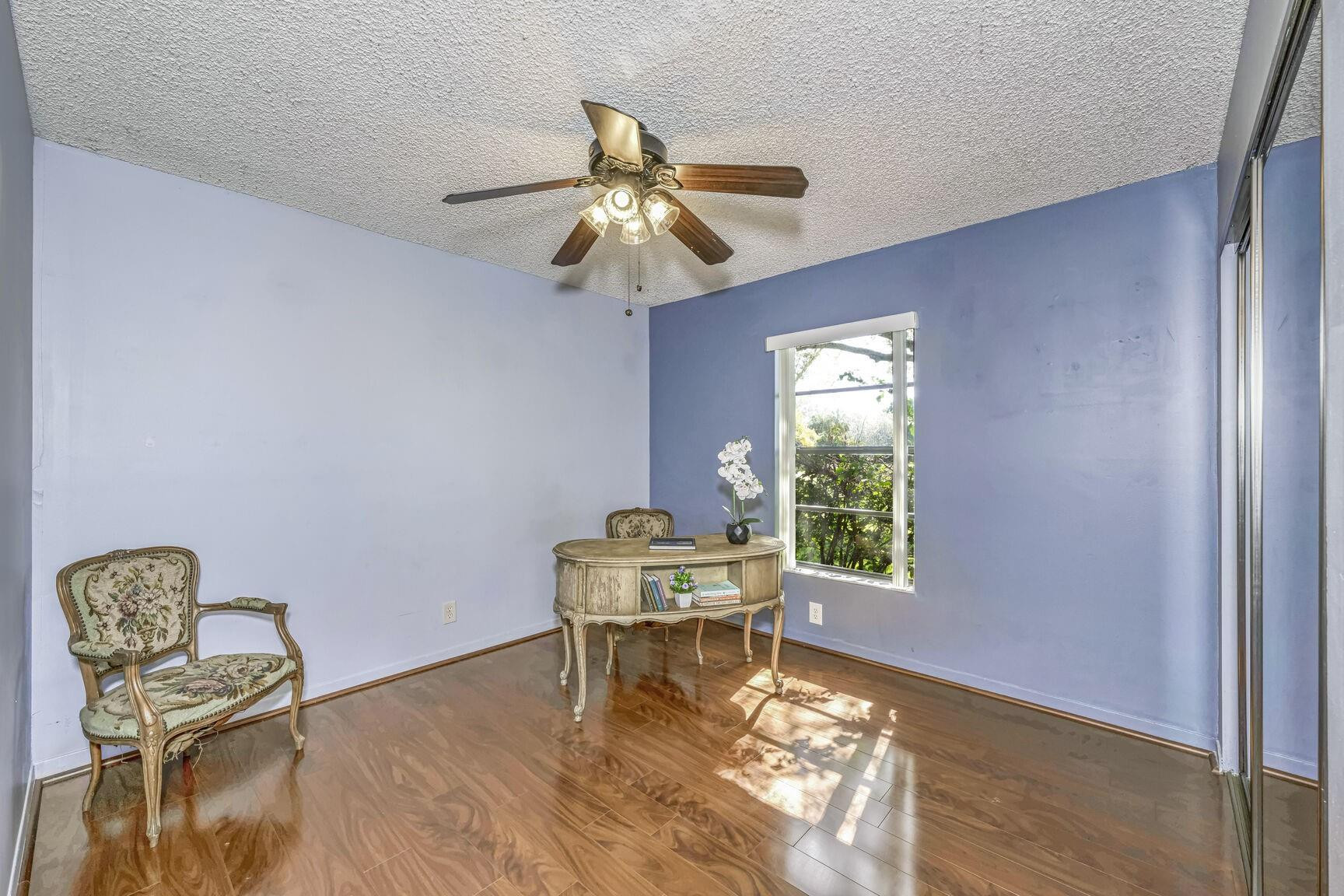 12630 Southwest 13th Manor Davie, FL 33325 - Photo 15 of 22 a living room with furniture and a window