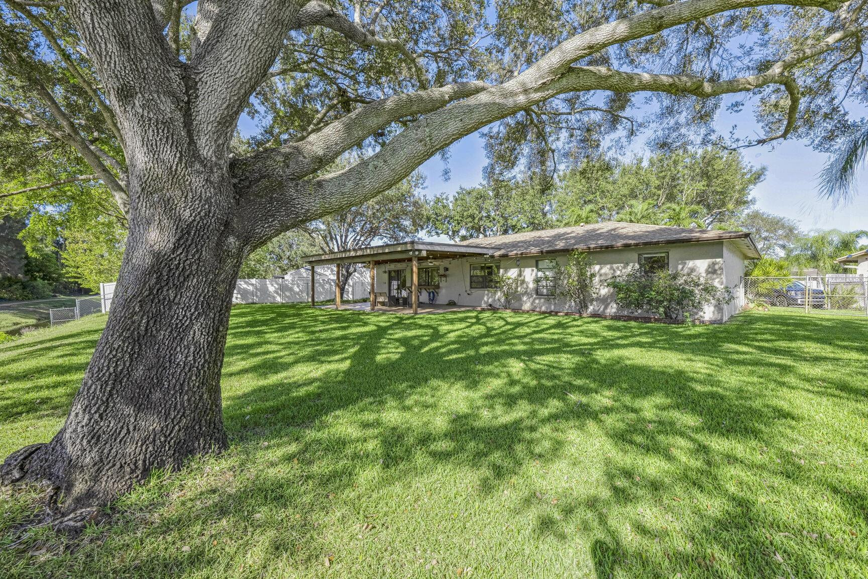 12630 Southwest 13th Manor Davie, FL 33325 - Photo 20 of 22 a view of a house with a yard