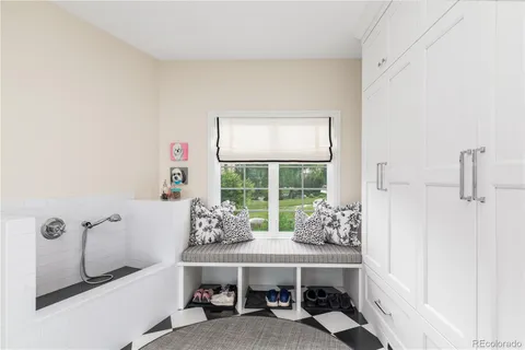 a utility room with sink dryer and washer
