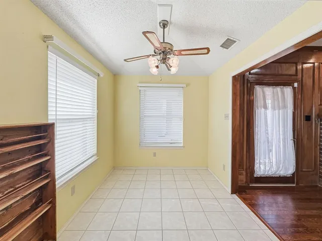 a view of an entryway with front door