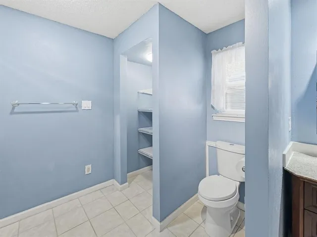 a bathroom with a toilet