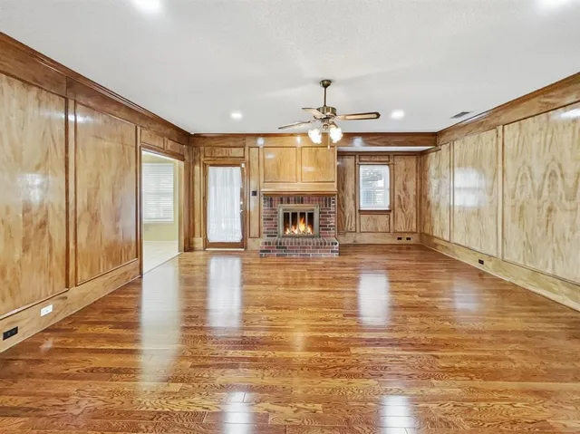 a view of a living room with a large window
