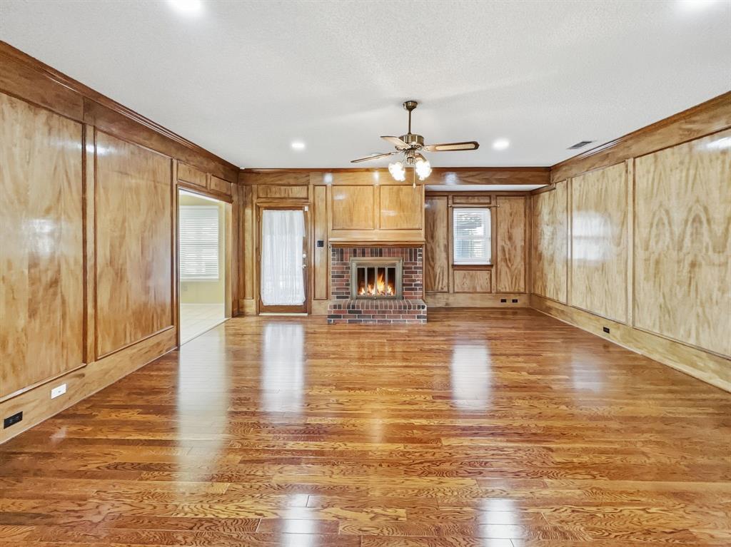302 Apollo Road Garland, TX 75040 - Photo 3 of 38 a view of a living room with a large window