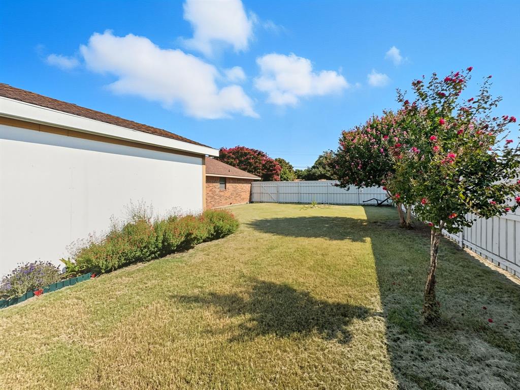 302 Apollo Road Garland, TX 75040 - Photo 35 of 38 a view of a backyard of the house