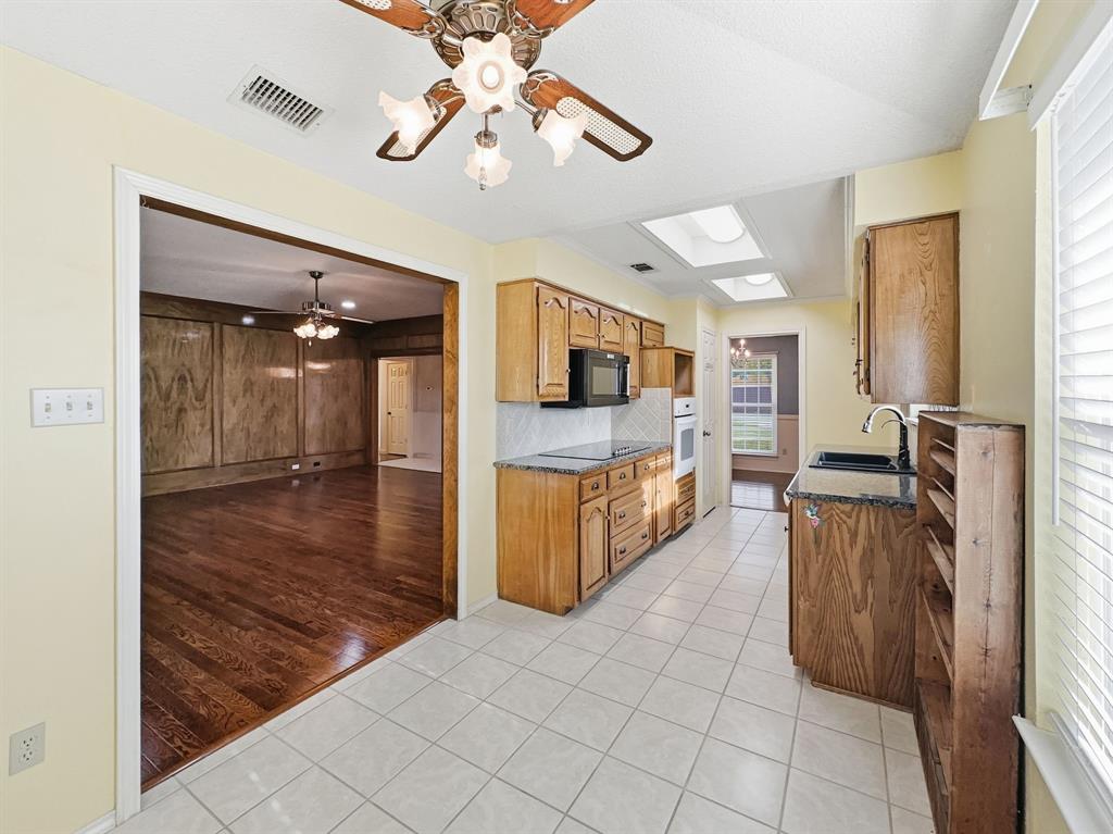 302 Apollo Road Garland, TX 75040 - Photo 10 of 38 a view interior of a house and kitchen view