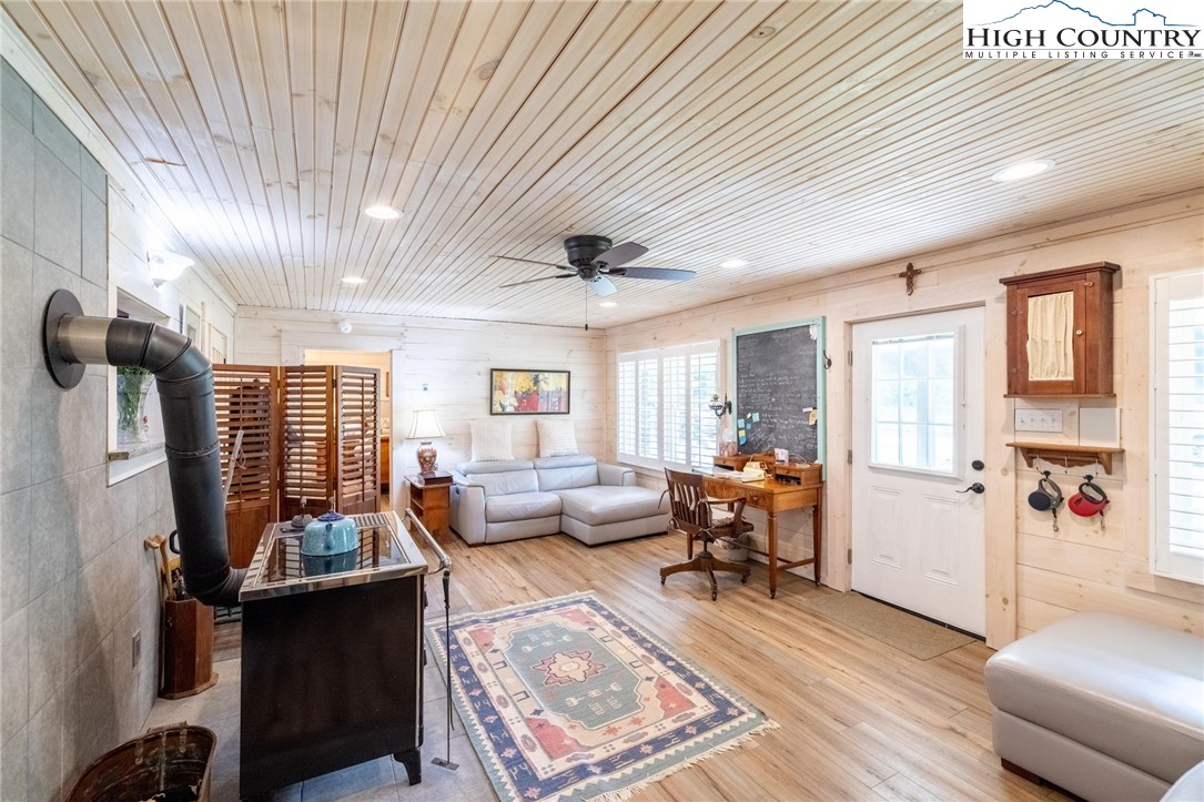 1369 Anderson Hill Road Lansing, NC 28643 - Photo 15 of 49 a living room with furniture and a large window