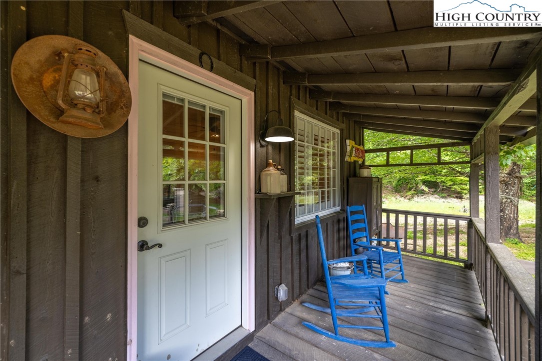1369 Anderson Hill Road Lansing, NC 28643 - Photo 32 of 49 a view of a porch with furniture
