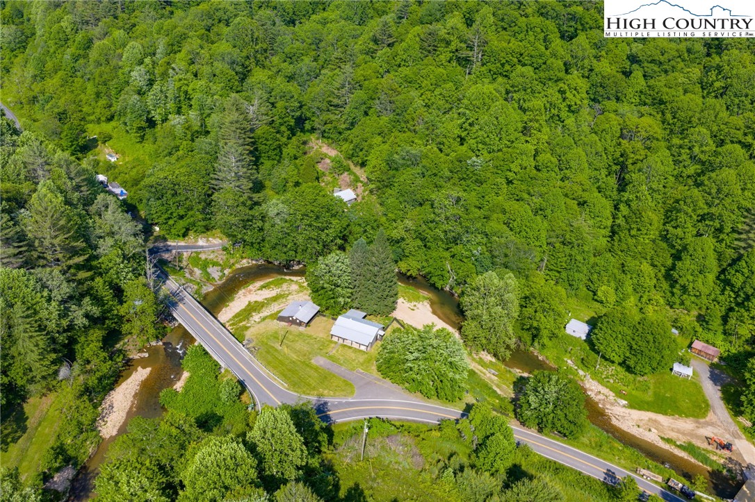 1369 Anderson Hill Road Lansing, NC 28643 - Photo 43 of 49 a view of a garden