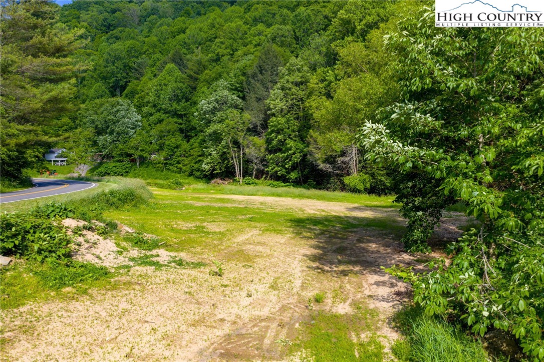 1369 Anderson Hill Road Lansing, NC 28643 - Photo 46 of 49 a view of a golf course with a house