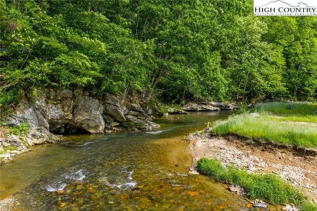 a view of a lake from a yard