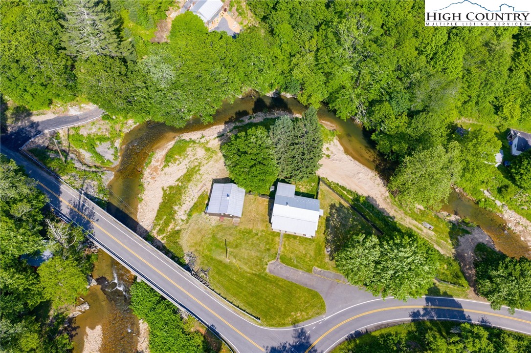 1369 Anderson Hill Road Lansing, NC 28643 - Photo 8 of 49 a view of swimming pool with a yard