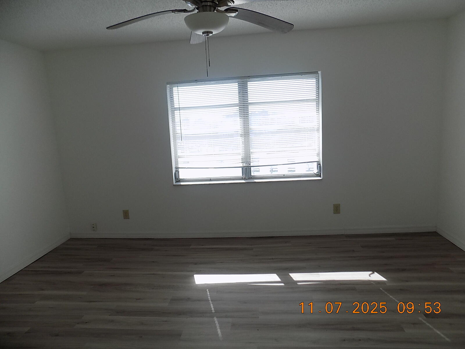 231 East Lantana Road, Unit 501 Lantana, FL 33462 - Photo 11 of 18 an empty room with wooden floor and windows