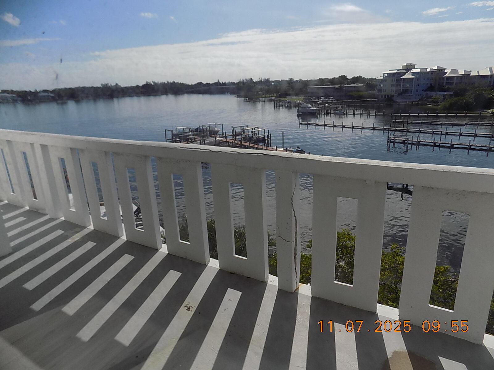 231 East Lantana Road, Unit 501 Lantana, FL 33462 - Photo 16 of 18 a view of a balcony with wooden floor and lake view
