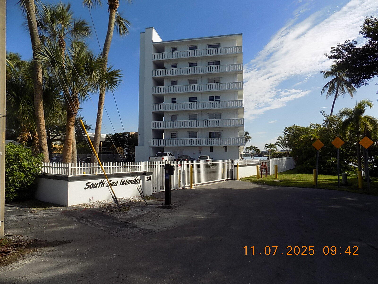 231 East Lantana Road, Unit 501 Lantana, FL 33462 - Photo 2 of 18 a view of tall buildings and a yard