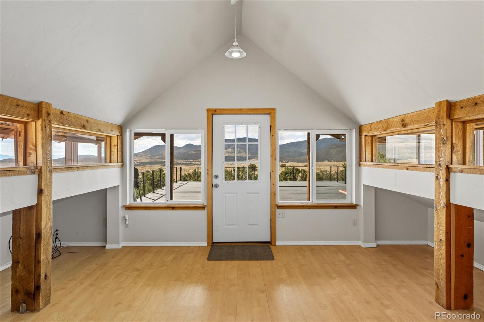 53997 County Rd LL56 Villa Grove, CO 81155 - Photo 19 of 34 an empty room with windows