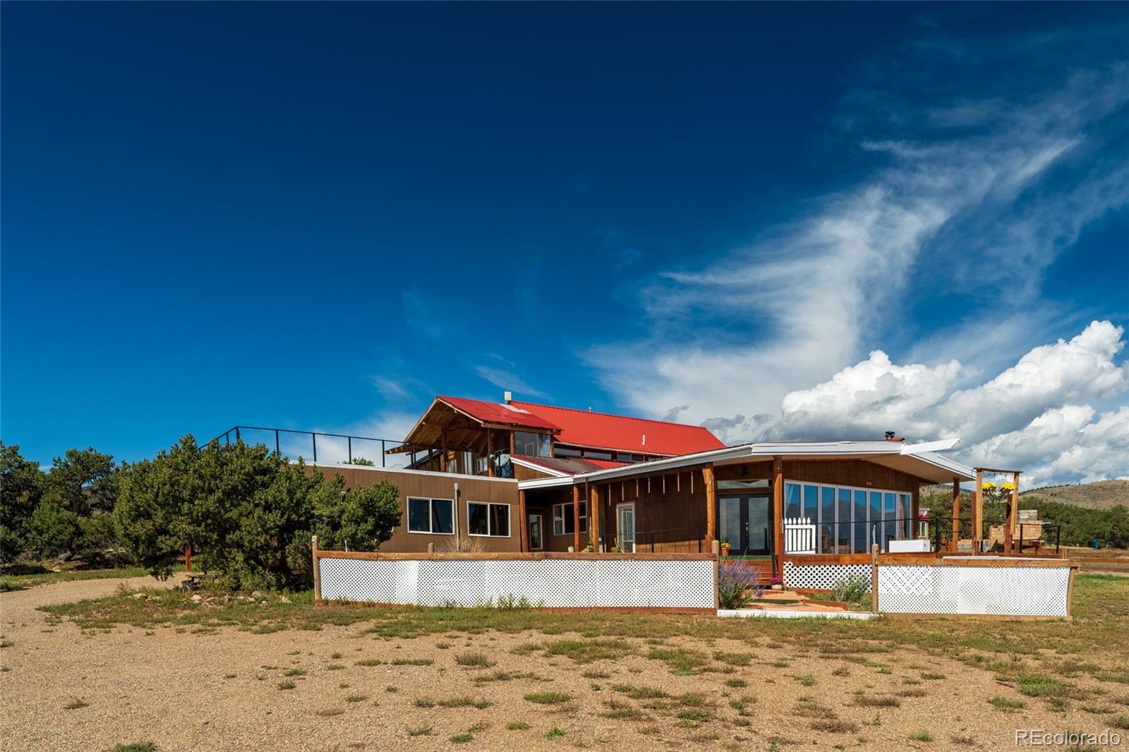 53997 County Rd LL56 Villa Grove, CO 81155 - Photo 25 of 34 a front view of a house with a yard