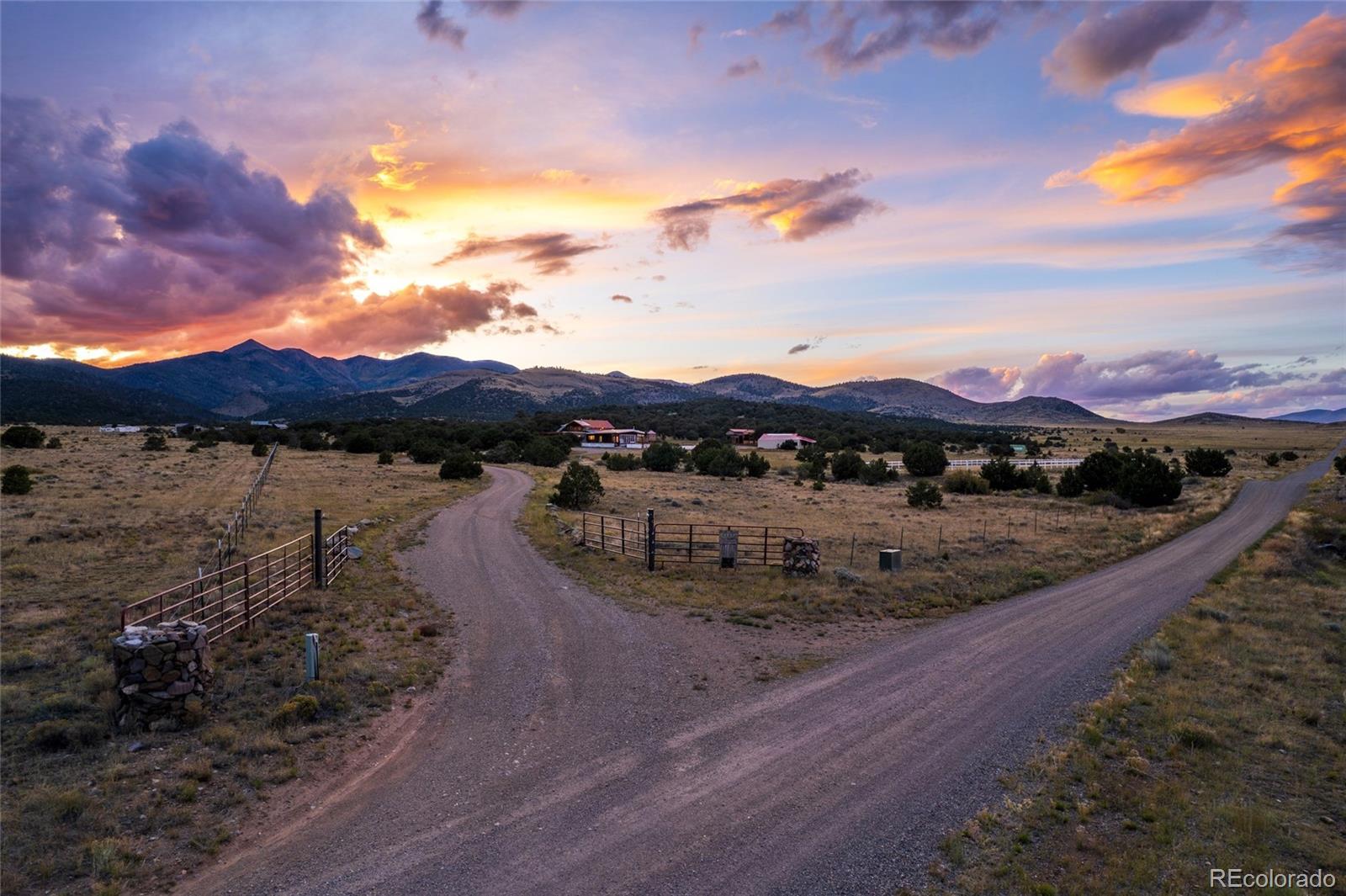 53997 County Rd LL56 Villa Grove, CO 81155 - Photo 30 of 34 a view of a lake with mountain in the background