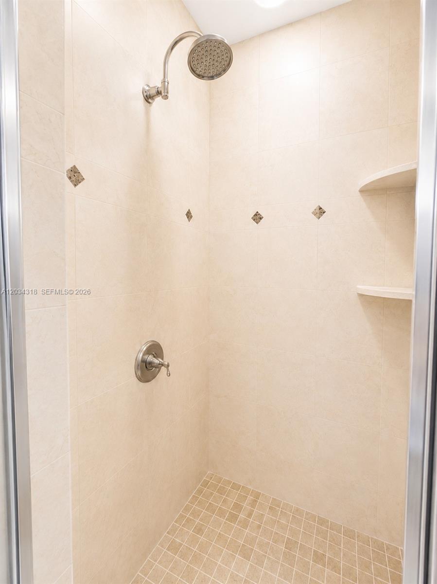 14856 Southwest 179th Street Miami, FL 33187 - Photo 22 of 33 a bathroom with a shower